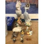 Group of ceramic ornaments, including a Royal Dux cockatoo, Lladro figure, Beswick, Royal Copenhagen