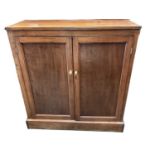 Victorian mahogany cupboard, shelved interior enclosed by pair of cupboard doors on plinth base, 103