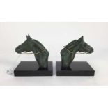 M Leducq pair of spelter horse head and neck bookends on rectangular black marble bases, signed, 13c
