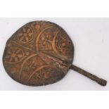 Unusual tribal embossed copper fan