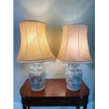 Pair of 19th century Chinese Canton enamel baluster vases, converted to lamps