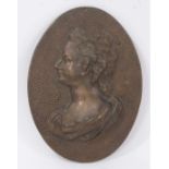 Oval bronze relief portrait plaque of a lady