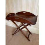 Antique mahogany butler's tray on stand, the tray with hinged sides with pierced integral carrying h