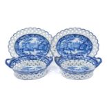 Pair of 19th century pearlware chestnut baskets and stands, printed in blue and white with landscape