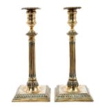 Pair of early George III paktong candlesticks