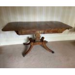 William IV rosewood and brass inlaid sofa table, with rounded rectangular drop-leaf top over two dra