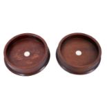 Pair of contemporary mahogany wine bottle coasters with inset silver discs to the centres (London 19