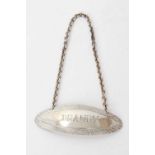 Contemporary silver decanter label of elliptical form, marked BRANDY
