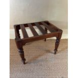 Victorian mahogany luggage stand, on turned supports, 58cm wide