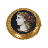 Victorian Etruscan Revival brooch with painted porcelain panel depicting a female bust
