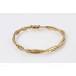 Italian 18ct yellow gold bracelet with two strands of plaited links, 19cm.