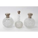 Pair large Victorian hobnail cut glass globe perfume bottles, with silver mounts