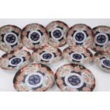 Set of six late 19th century Japanese imari pattern plates with six character marks to underside, to