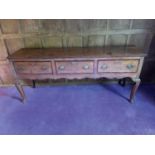 George III oak dresser base with three drawers, brass handles and cabriole legs, 187cm wide x 49cm d