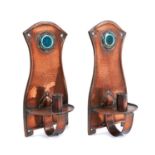 Pair of Arts and Crafts copper wall sconces, each with Ruskin style cabochon inset ceramic boss, 30c