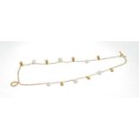 Links of London 18ct gold and cultured pearl two-strand bracelet, the pear shape pearls interspaced