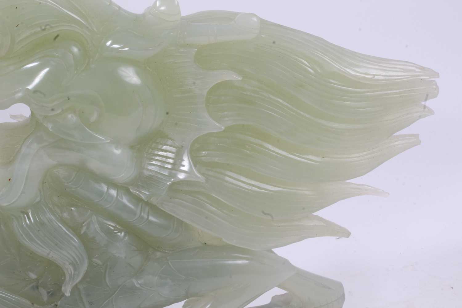 Large Chinese jade or green hardstone carving of a mythical beast, raised on wooden plinth, 43cm lon - Image 5 of 7