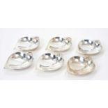 Set of six Tiffany silver dishes in the form of heart shaped leaves, with leaf handles