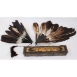 19th century Chinese black lacquer fan case, together with two tortoiseshell and eagle feather fans
