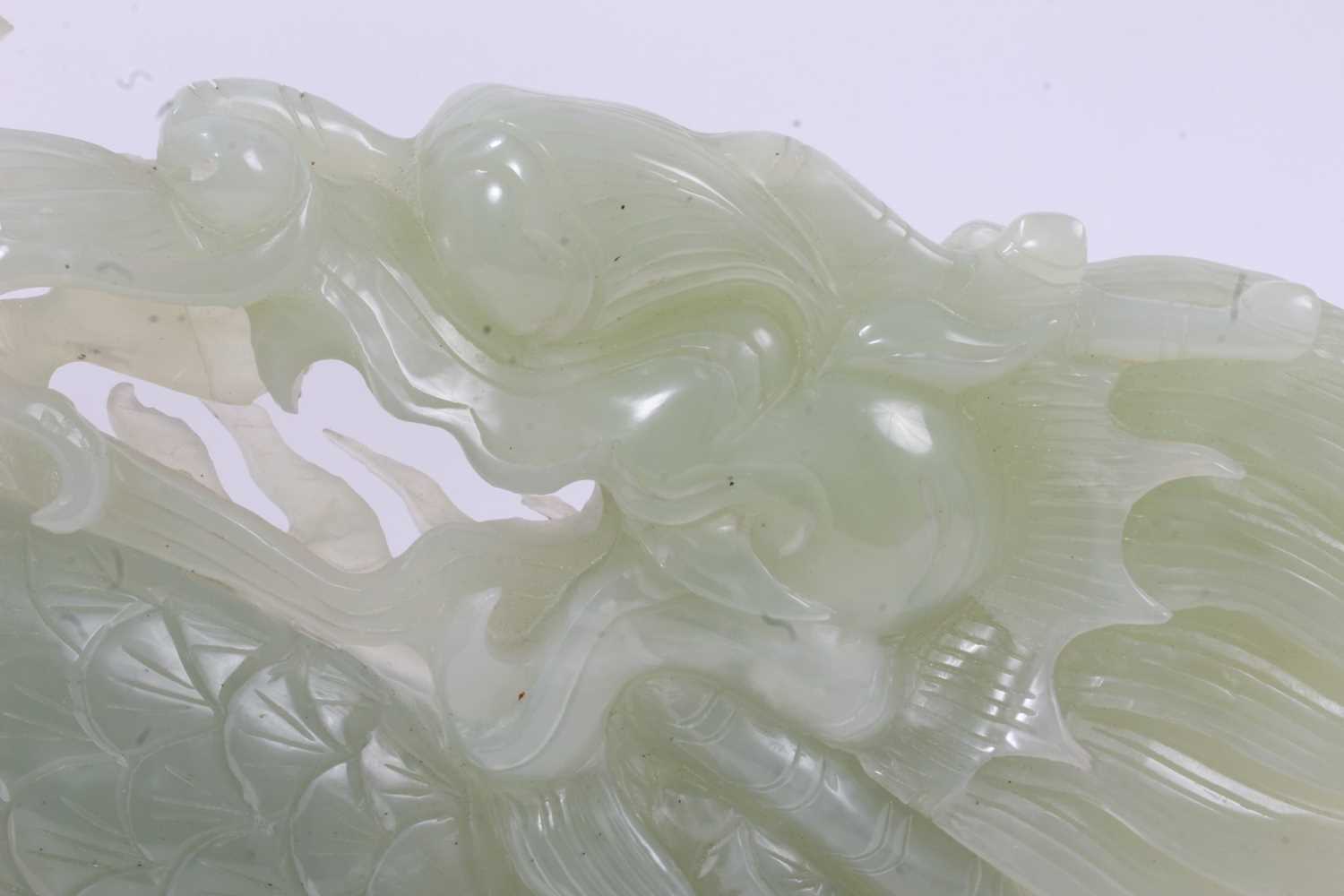 Large Chinese jade or green hardstone carving of a mythical beast, raised on wooden plinth, 43cm lon - Image 4 of 7