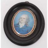 Late 18th century oval portrait miniature on ivory depicting a gentleman in blue coat, within a doub