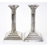 Pair Victorian silver plated Corinthian column candlesticks of conventional form