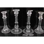 Two pairs of 19th century cut glass candlesticks, 25cm and 27.5cm high