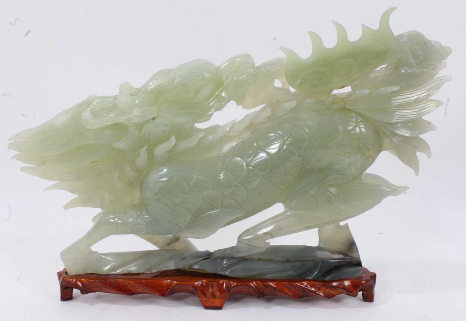 Large Chinese jade or green hardstone carving of a mythical beast, raised on wooden plinth, 43cm lon - Image 7 of 7
