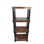 Unusual George III four tier mahogany whatnot with ebonised gun barrel supports