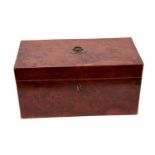 Early 19th century figured yew wood tea caddy, with glass mixing bowl and flanking lidded compartmen