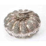 Far Eastern white metal Betel Nut box, in the form of a gourd, with embossed foliate sections