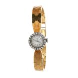 1950s ladies 18ct gold Omega wristwatch with diamond bezel