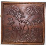 Antique Chinese relief carved wooden plaque, depicting a tortoise and lotus flowers