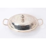 Early American colonial silver entree dish of oval form with twin handles and separate cover
