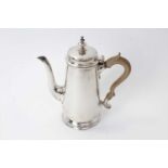 Early 20th century silver coffee pot of tapering cylindrical form, in the George II style