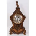 19th century French ormolu mounted cartouche shaped bracket clock, retailed by Cousens and Whiteside