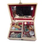 Jewellery box containing vintage costume jewellery including a Victorian silver brooch, paste set br