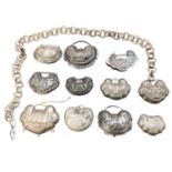 Collection of eleven Chinese white metal padlock style pendants with floral scroll and character mar