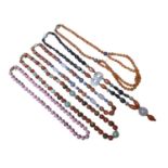 Five Chinese bead necklaces including green hard stone, pink hard stone, carnelian, hematite, enamel