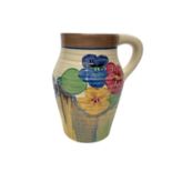 Clarice Cliff Newport Pottery Bizarre range pansies jug with hand painted decoration, 15.5cm high