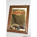 A 'Wills's Gold Flake Cigarettes' advertising mirror in oak frame, 41cm x 31cm