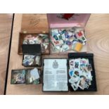 4 boxes of stamps including GB and World, in albums, stockbooks, loose and on paper.