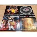 Vintage case of LP records featuring Queen and associated members