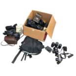 Large quantity of cameras and equipment, including Pentax, Minolta, Polaroid, Kodak, etc