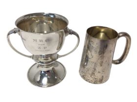 1930s silver two handled cup with flared rim and a silver glass bottom tankard,