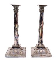 Pair of Georgian rococo old Sheffield plate candlesticks