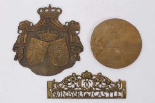 Brass Coat of Arms for Queen Victoria’s daughter and husband, plus a brass plaque bearing legend “Wi