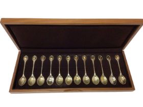 Cased set of twelve RSPB silver teaspoons, with silver gilt terminals