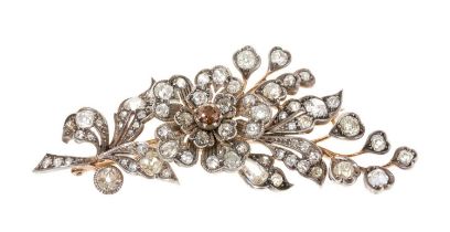 Victorian diamond floral spray brooch with en tremblant flower with a coloured diamond to the centre