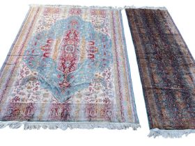 Two part silk rugs, the larger with concentric medallion on duck egg ground, 185 x 140, the other a